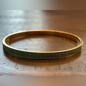 Kate Spade “on the dot” hinged bangle with gold-plated accents